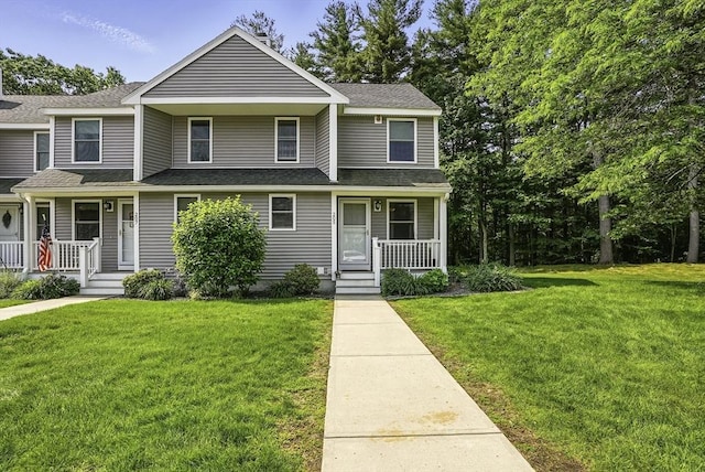 205 Bayberry Hill Ln Unit 205, Leominster, MA 01453 - view of front of house featuring a porch, a front lawn, and a shingled roof