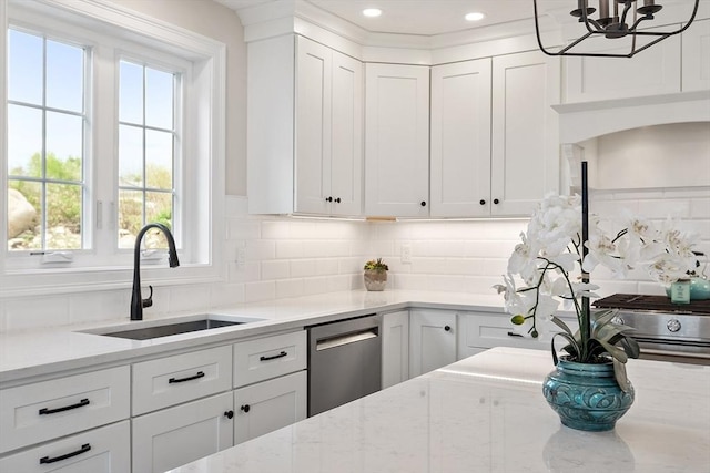 16 Dean Ln Unit 16, Littleton, MA 01460 - kitchen with a sink, stainless steel appliances, plenty of natural light, backsplash, and recessed lighting