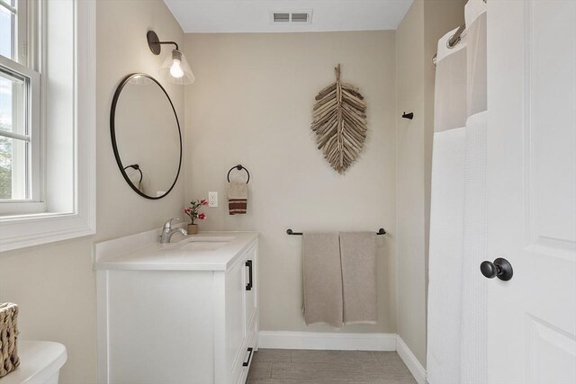 16 Dean Ln Unit 16, Littleton, MA 01460 - full bath with vanity, toilet, and baseboards