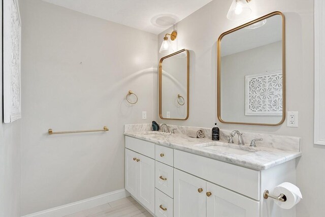 16 Dean Ln Unit 16, Littleton, MA 01460 - full bathroom with double vanity and baseboards