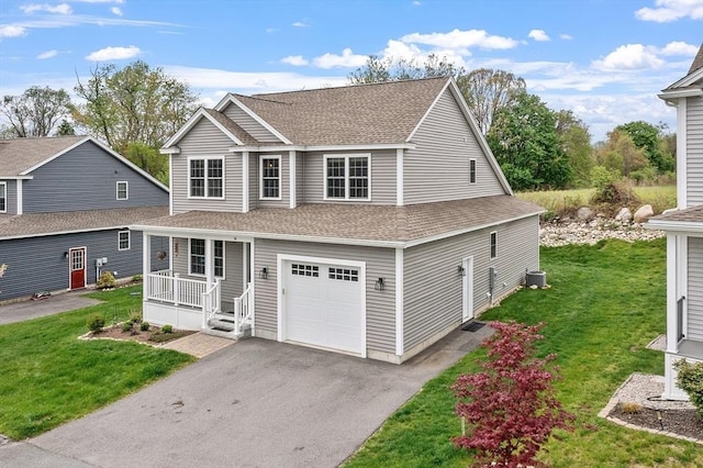 16 Dean Ln Unit 16, Littleton, MA 01460 - traditional-style home featuring a shingled roof, covered porch, a garage, a front yard, and driveway