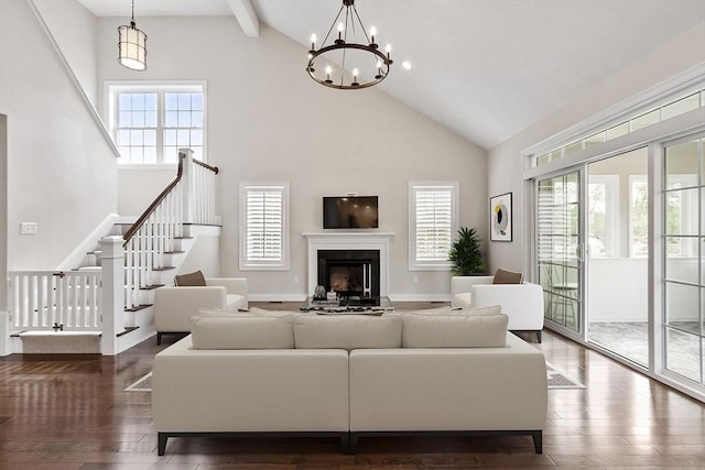 16 Dean Ln Unit 16, Littleton, MA 01460 - living area with high vaulted ceiling, plenty of natural light, stairway, dark wood-style floors, and beamed ceiling