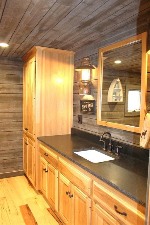80 Populatic St, Franklin, MA 02038 - bar with a sink, wood ceiling, wood walls, and light wood-type flooring