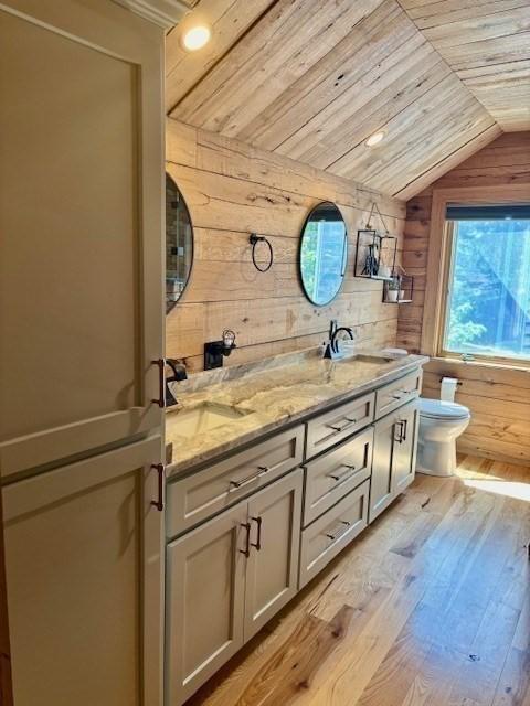 80 Populatic St, Franklin, MA 02038 - full bathroom with wooden walls, wooden ceiling, lofted ceiling, double vanity, and wood finished floors