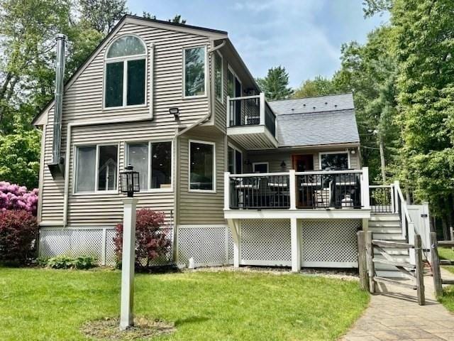 80 Populatic St, Franklin, MA 02038 - view of front of home with a balcony, a front yard, and a wooden deck