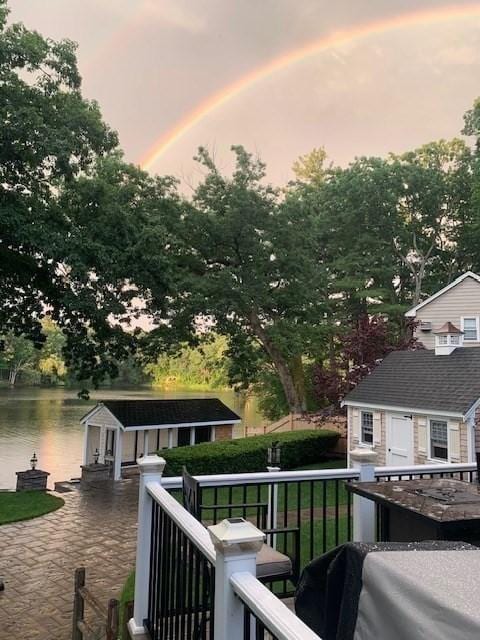 80 Populatic St, Franklin, MA 02038 - balcony at dusk featuring a water view