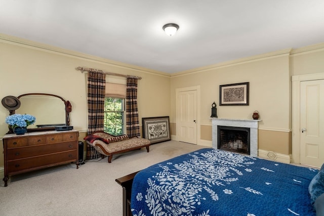 carpeted bedroom featuring crown molding