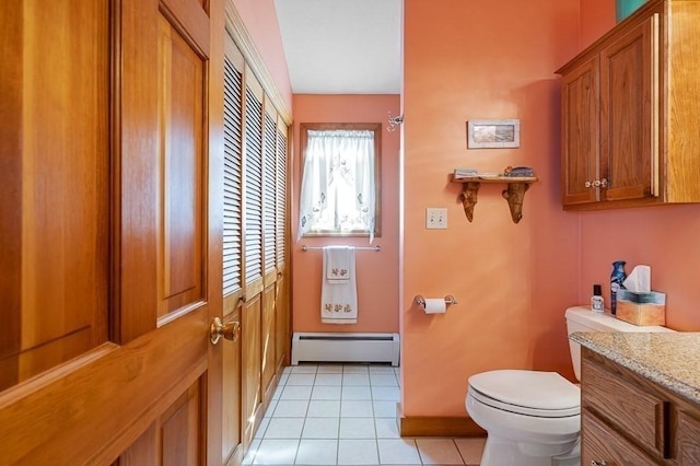 bathroom featuring tile patterned flooring, a baseboard radiator, toilet, and vanity