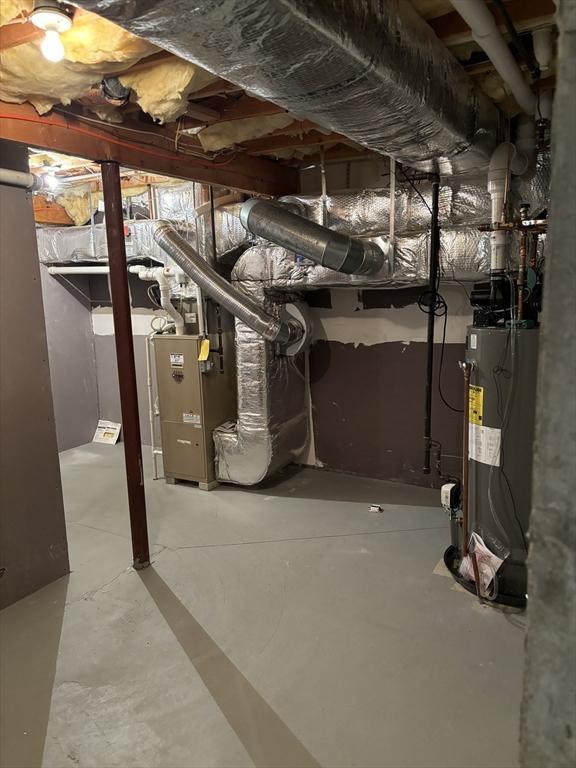 basement featuring water heater