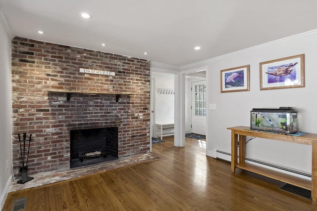 50 Deerfield Rd, Barnstable, MA 02655 - unfurnished living room with wood finished floors, ornamental molding, a fireplace, and visible vents