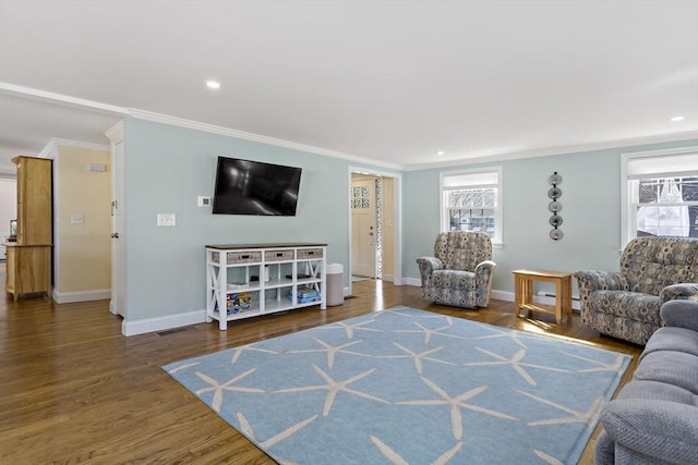 50 Deerfield Rd, Barnstable, MA 02655 - living room with wood finished floors, crown molding, baseboards, and a wealth of natural light