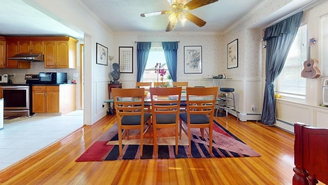118 Colby Rd, Quincy, MA 02171 - dining room featuring a wainscoted wall, light wood finished floors, ornamental molding, and a ceiling fan