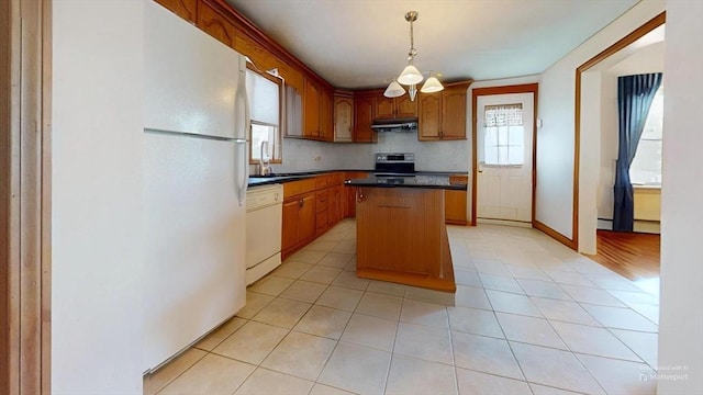 118 Colby Rd, Quincy, MA 02171 - kitchen featuring white appliances, dark countertops, a kitchen island, under cabinet range hood, and a chandelier