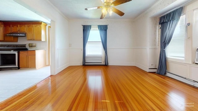 118 Colby Rd, Quincy, MA 02171 - unfurnished room with healthy amount of natural light, crown molding, light wood-type flooring, a ceiling fan, and wainscoting