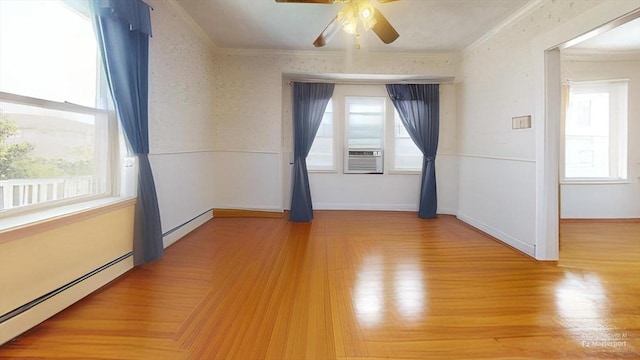 118 Colby Rd, Quincy, MA 02171 - empty room featuring baseboard heating, ornamental molding, plenty of natural light, ceiling fan, and cooling unit