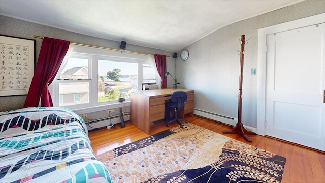 118 Colby Rd, Quincy, MA 02171 - bedroom featuring a baseboard radiator, wood finished floors, and lofted ceiling