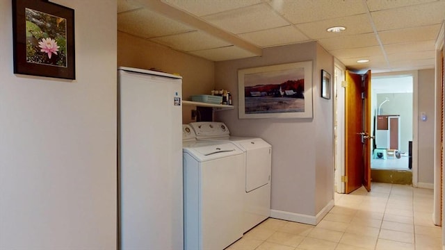 118 Colby Rd, Quincy, MA 02171 - laundry area featuring separate washer and dryer and light tile patterned floors