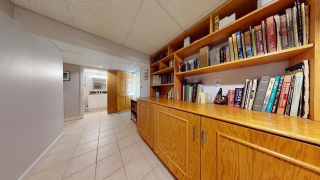 118 Colby Rd, Quincy, MA 02171 - hallway featuring a paneled ceiling and light tile patterned floors