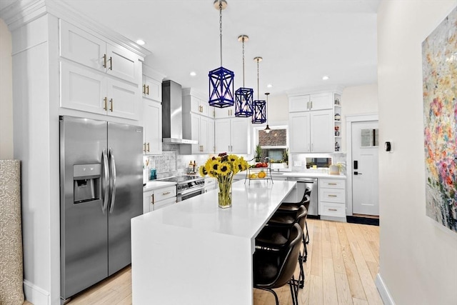 kitchen with backsplash, appliances with stainless steel finishes, open shelves, recessed lighting, and wall chimney exhaust hood