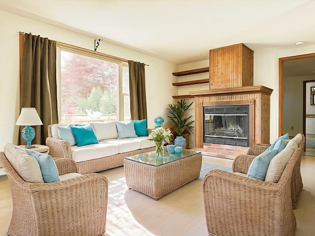 3 Teal Cir, Fairhaven, MA 02719 - living room with light wood-style flooring and a glass covered fireplace