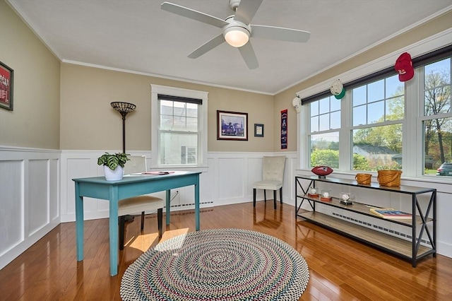home office featuring plenty of natural light and crown molding