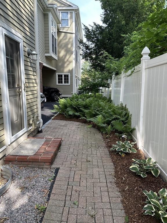 view of patio featuring fence