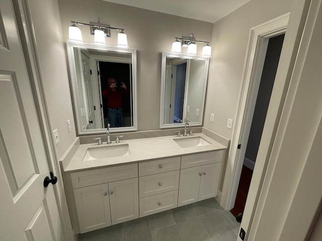 bathroom featuring tile patterned floors and vanity