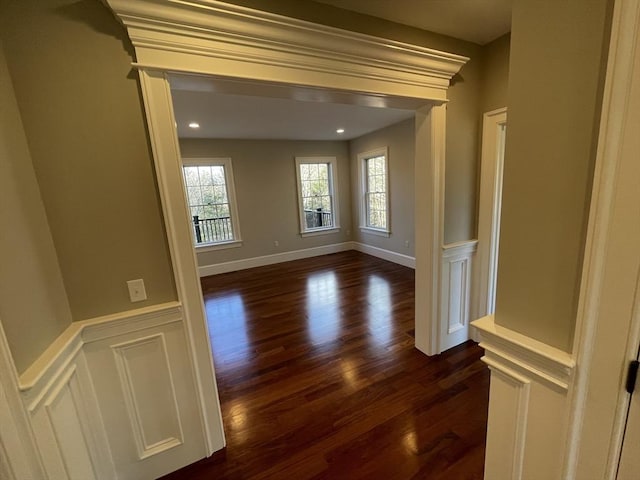 spare room with dark wood-type flooring