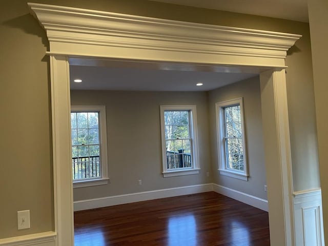 spare room featuring dark hardwood / wood-style flooring