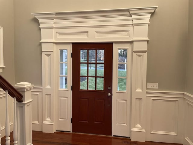 foyer with dark wood-type flooring