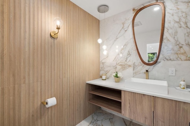216 Aspinwall Ave, Brookline, MA 02446 - bathroom featuring vanity and marble finish flooring