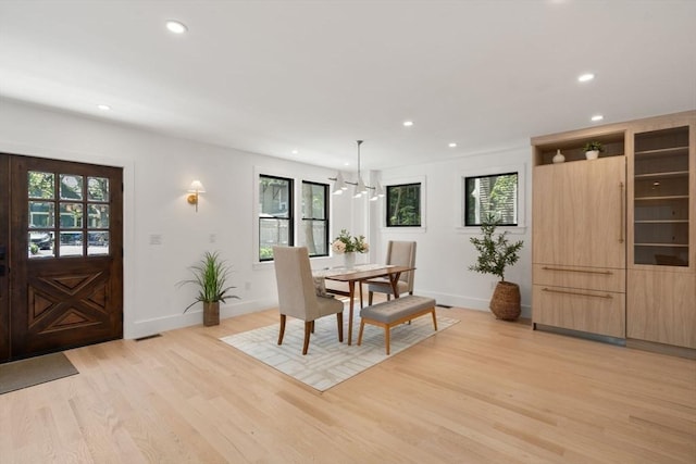 216 Aspinwall Ave, Brookline, MA 02446 - dining space featuring recessed lighting, plenty of natural light, a chandelier, light wood-type flooring, and baseboards
