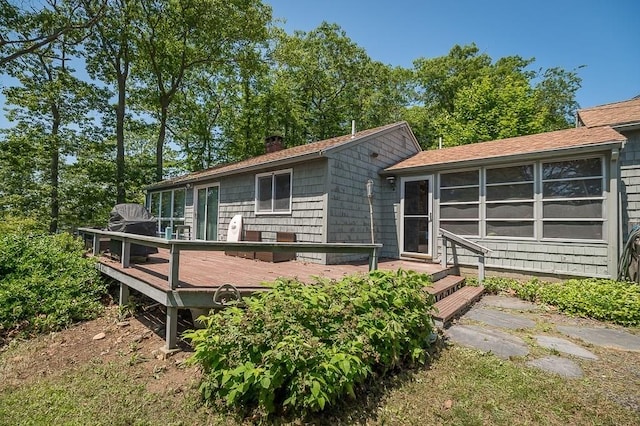 3 Ridgewood Rd, Rockport, MA 01966 - view of front facade featuring a wooden deck and a chimney