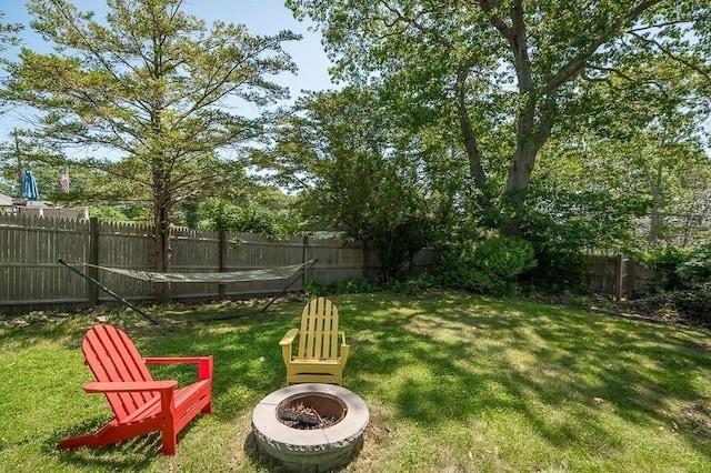 3 Ridgewood Rd, Rockport, MA 01966 - fenced backyard featuring a fire pit