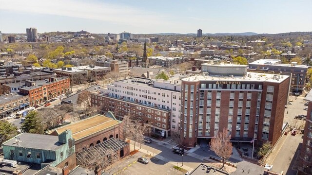 birds eye view of property with a city view