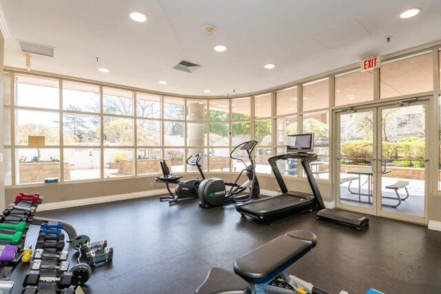 workout area with plenty of natural light, recessed lighting, and visible vents