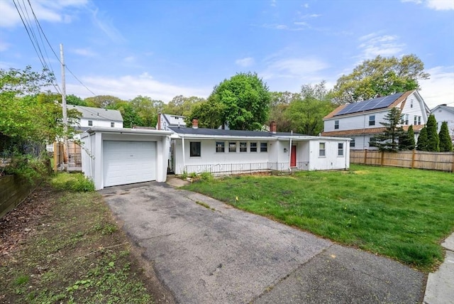 10 Gretter Rd, Boston, MA 02132 - view of front facade with an attached garage, asphalt driveway, and a chimney
