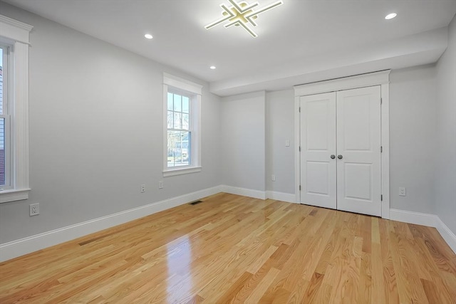 unfurnished bedroom featuring light hardwood / wood-style floors