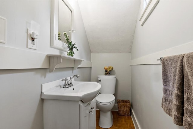 330 Fairview Ave, Rehoboth, MA 02769 - half bathroom with toilet, vanity, and vaulted ceiling