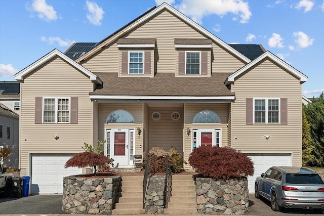 view of front of home with a garage