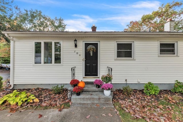 view of front of property with a chimney