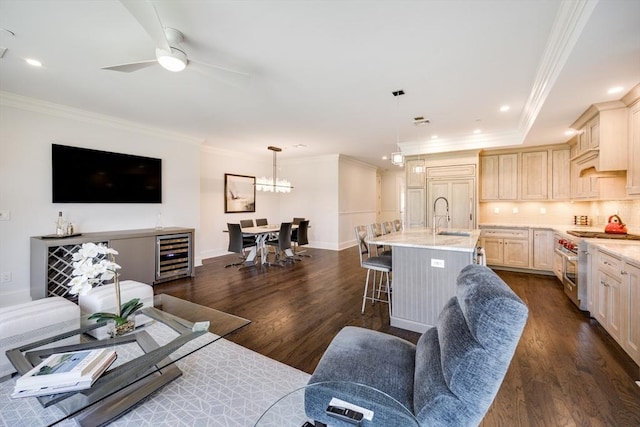 66 Simons Unit C, Mashpee, MA 02649 - living room featuring wine cooler, ornamental molding, dark wood-style flooring, a ceiling fan, and recessed lighting