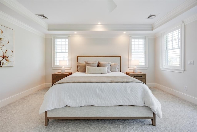 66 Simons Unit C, Mashpee, MA 02649 - carpeted bedroom featuring crown molding, multiple windows, and a tray ceiling