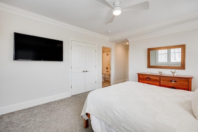 66 Simons Unit C, Mashpee, MA 02649 - bedroom featuring crown molding, carpet, a ceiling fan, a closet, and ensuite bathroom