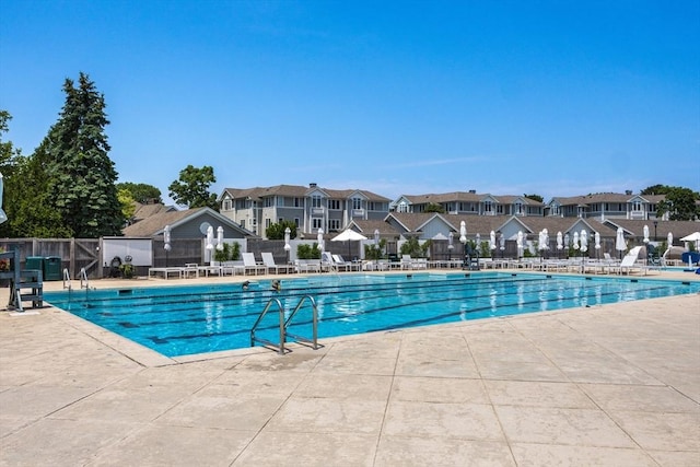 66 Simons Unit C, Mashpee, MA 02649 - community pool featuring a residential view and a patio area