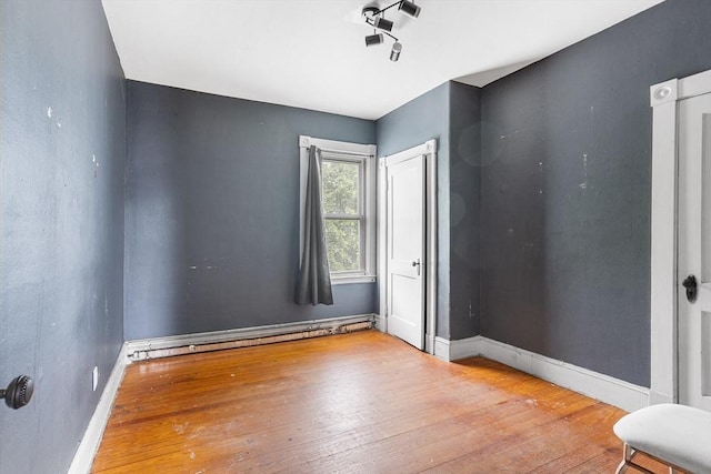 369-371 Mill St, New Bedford, MA 02740 - spare room featuring hardwood / wood-style floors and baseboards