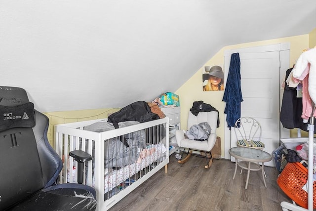 369-371 Mill St, New Bedford, MA 02740 - bedroom with wood finished floors and lofted ceiling