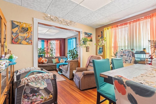 369-371 Mill St, New Bedford, MA 02740 - dining area featuring wood finished floors and a paneled ceiling