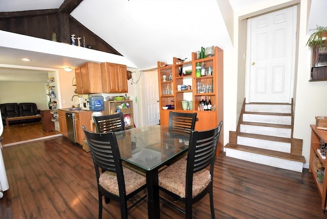 dining room featuring dark wood-style floors, stairway, and high vaulted ceiling