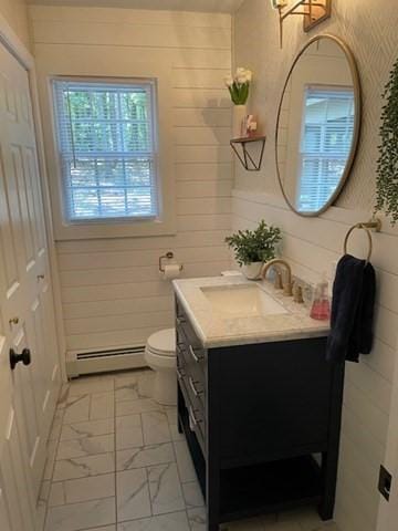 bathroom featuring a baseboard radiator, marble finish floor, vanity, and toilet